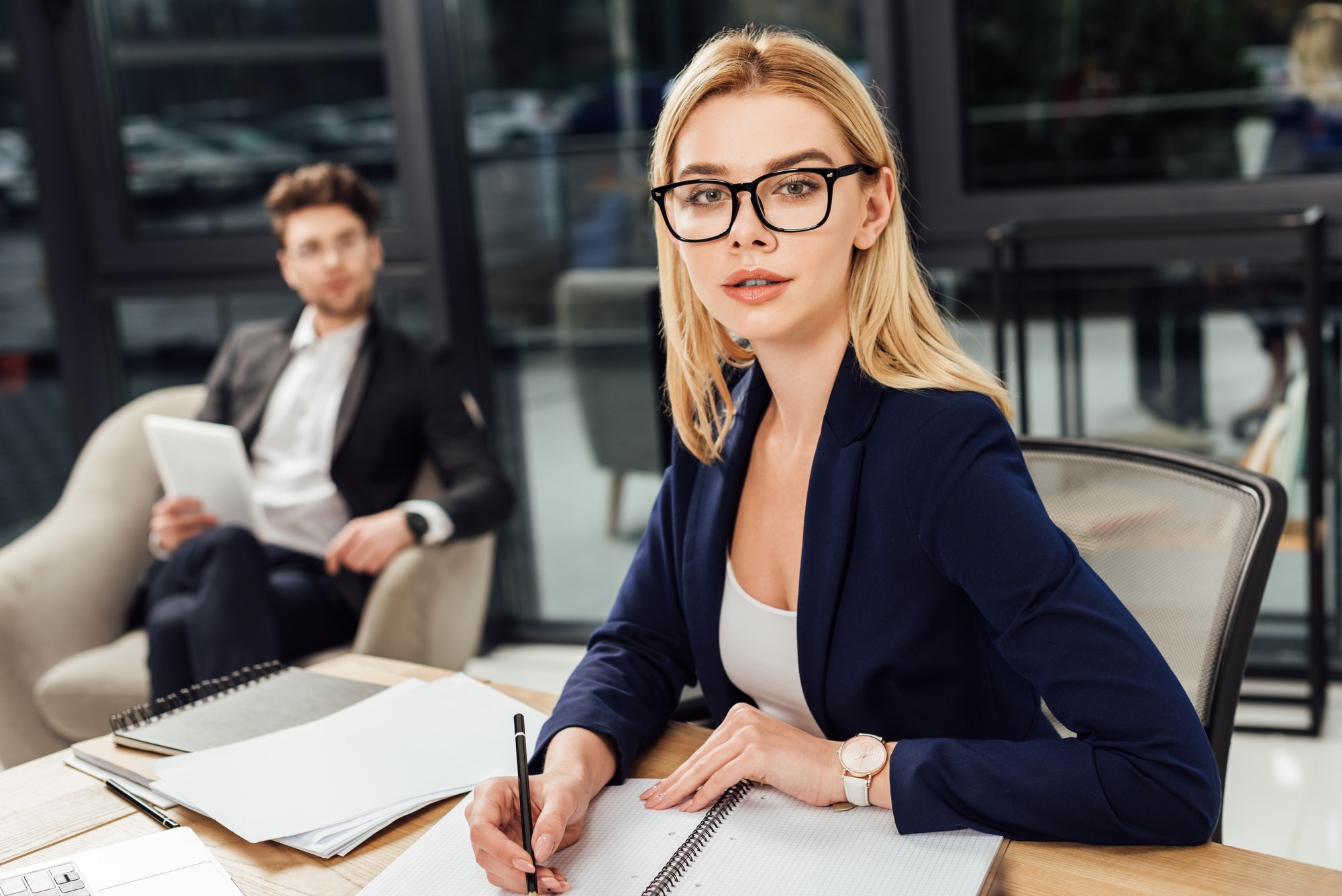 selective-focus-of-businessman-looking-at-businesswoman-in-eyeglasses-that-looking-at-camera-at.jpg selective-focus-of-businessman-looking-at-businesswoman-in-eyeglasses-that-looking-at-camera-at.jpg
